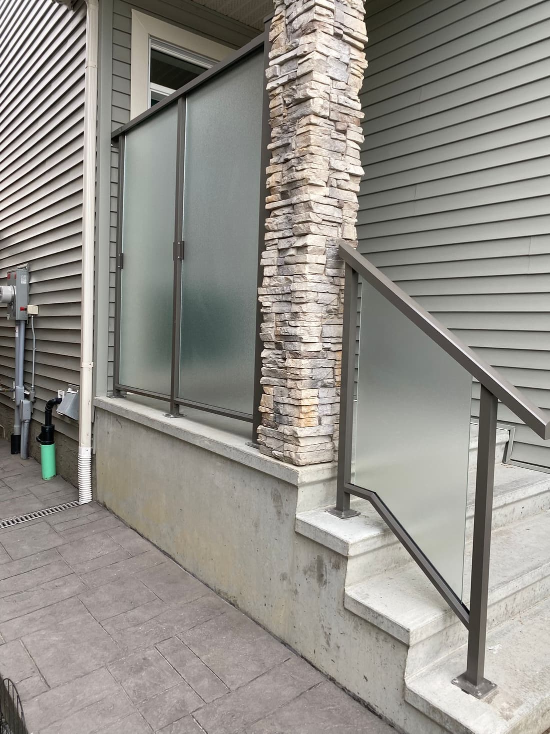 Aluminum-framed glass railing project in Edmonton — photo 1